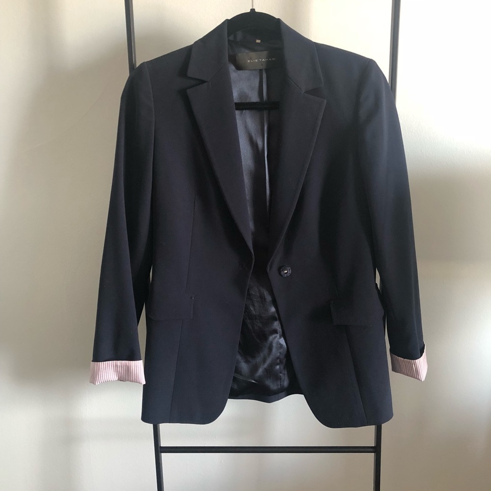Navy blazer with striped pink details